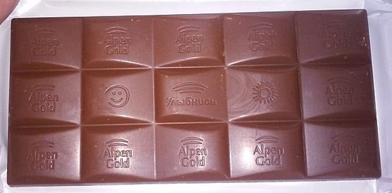 Сколько долек в милке. Альпенголд шоколад дольки. Шоколад Альпен Гольд. Альпен Гольд дольки. Дольки шоколада Alpen Gold.